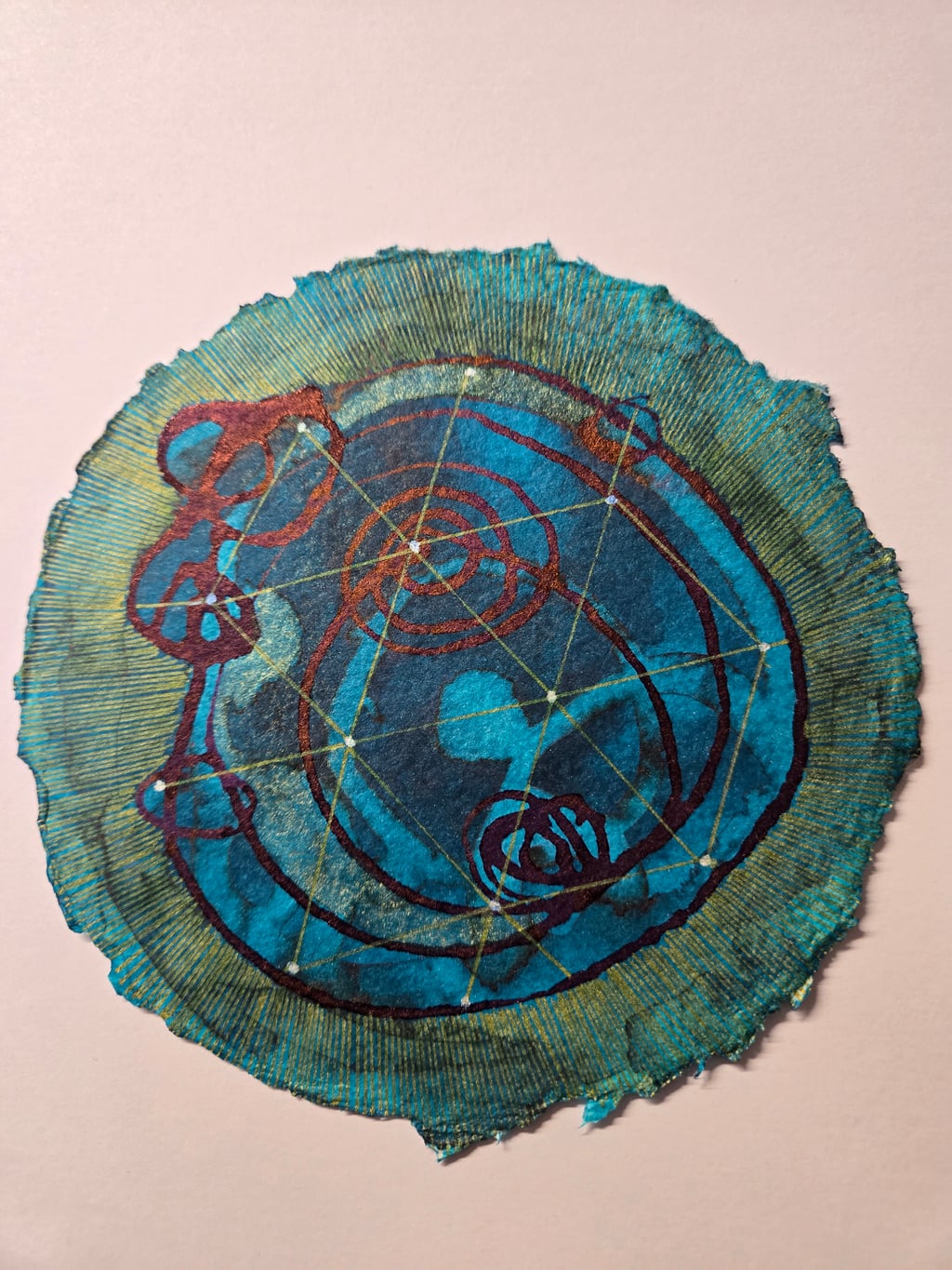 Blue washes, organic shapes, organized lines and forms on handmade paper 