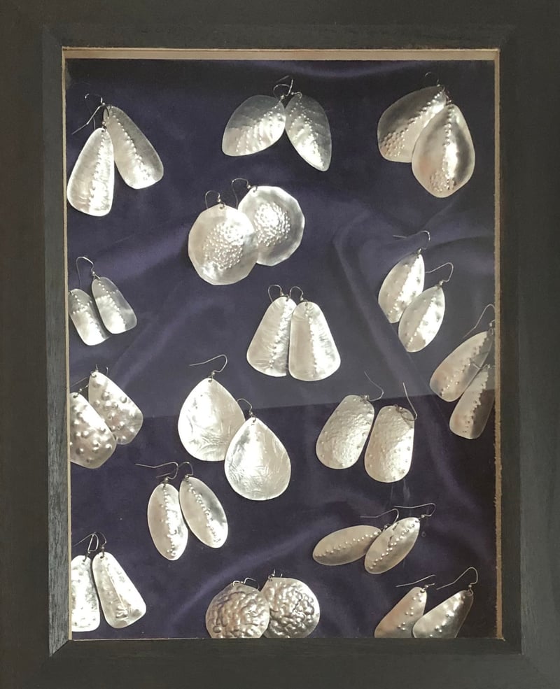Hand-forged Earrings in Display Case